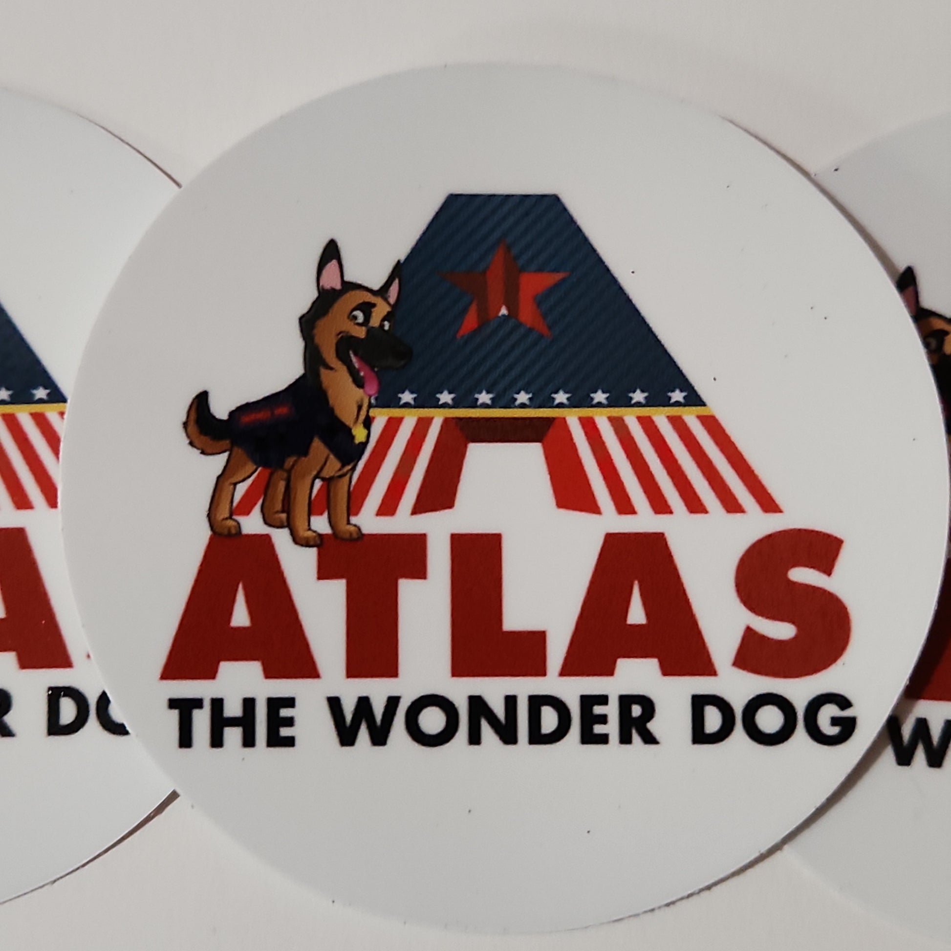 Cartoon style German Shepherd hero dog next to large red white and blue words that say Atlas the Wonderdog